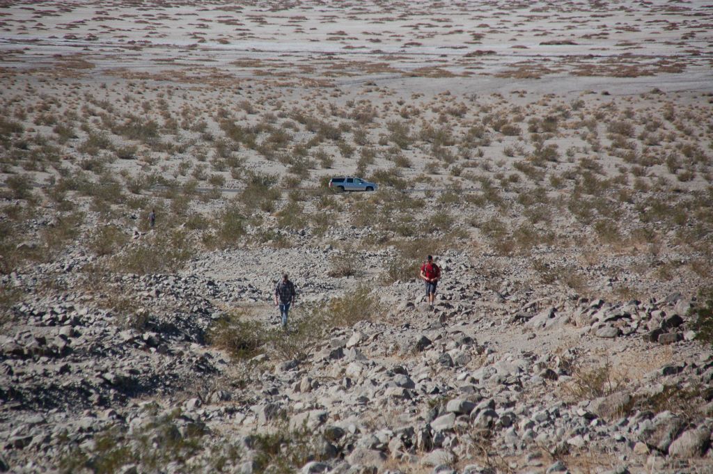 Hiking up a very rocky wash with small boulders everywhere: